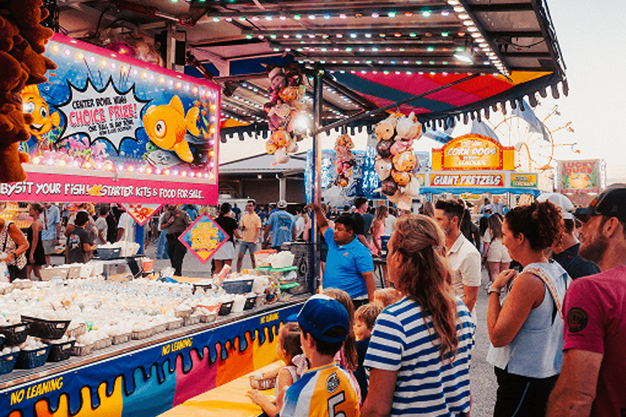 Carnival games and midway lights.