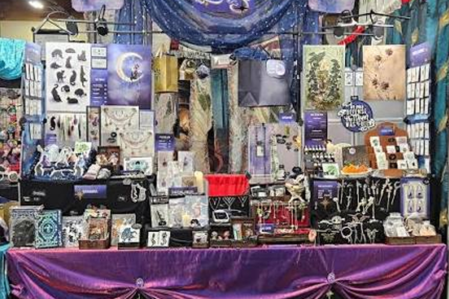 Guests browsing a Halloween market.